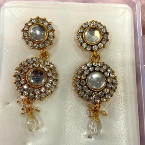Brand new earrings in gold and silver